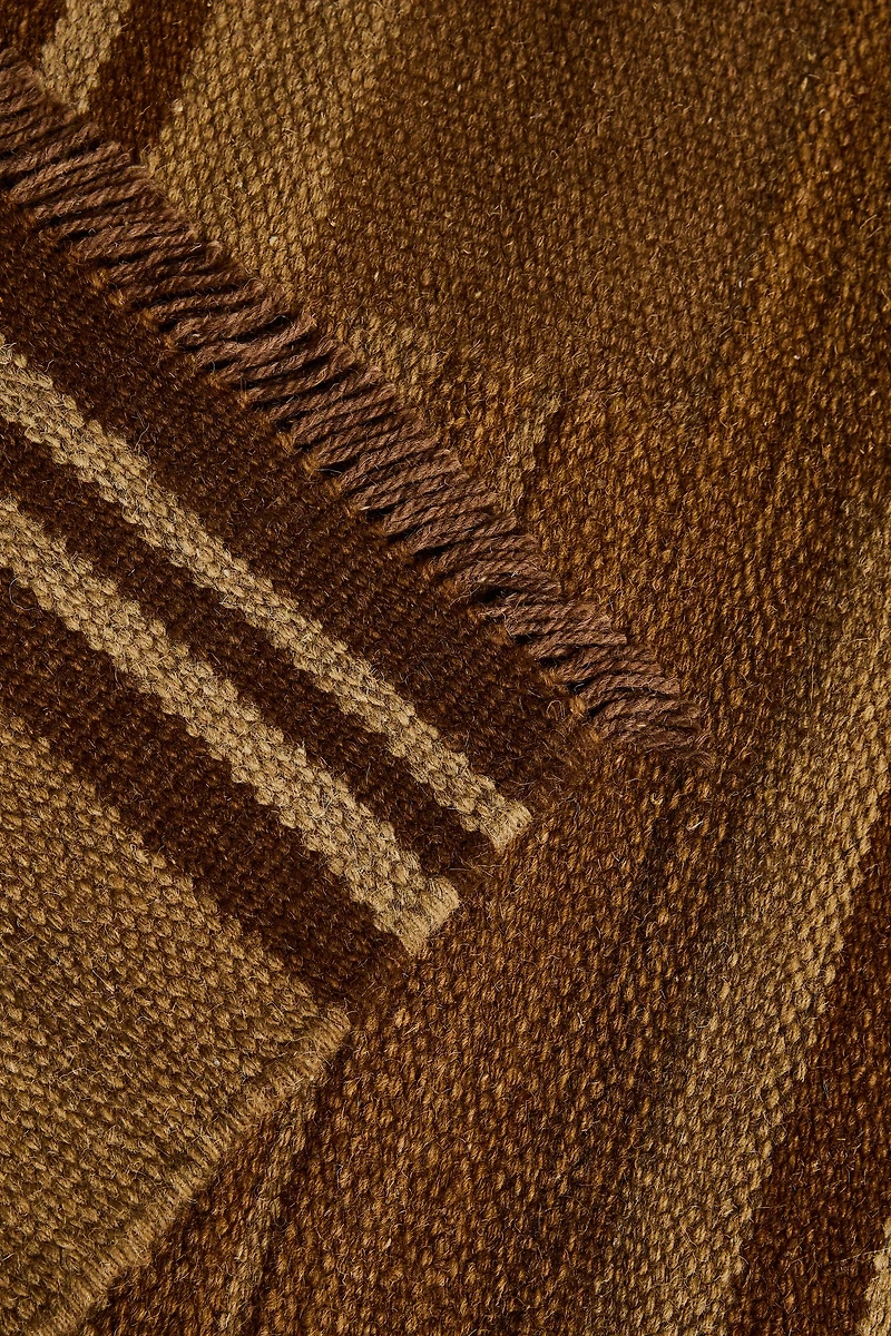 STRIPED AREA RUG WITH FRINGING