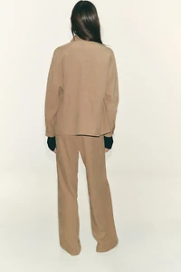 VESTE À POCHES ET TAILLE AJUSTABLE