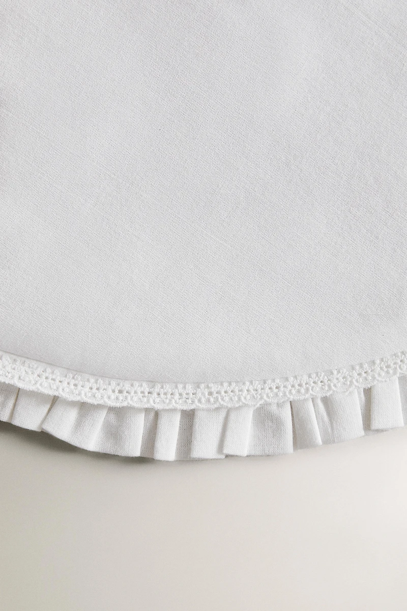 ROUND PLACEMAT WITH RUFFLE