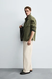 PLEATED STRIPE PANTS