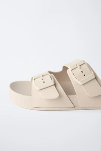 BUCKLED POOL SLIDES