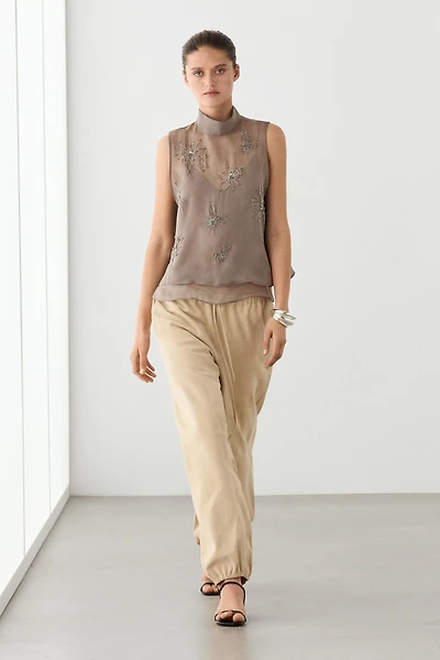 Semi-sheer top with embroidered detail
