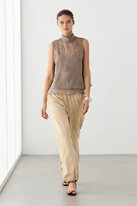 Semi-sheer top with embroidered detail