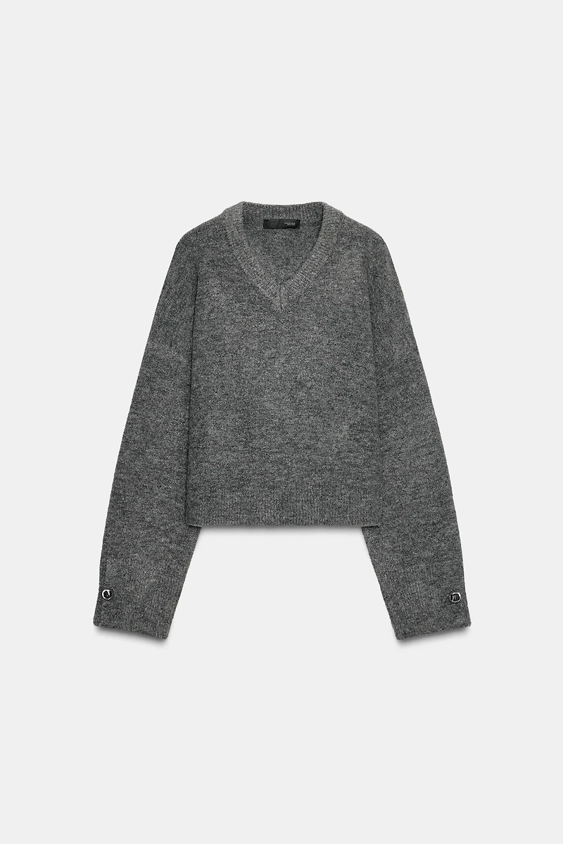 PULL EN MAILLE DOUX À BOUTONS