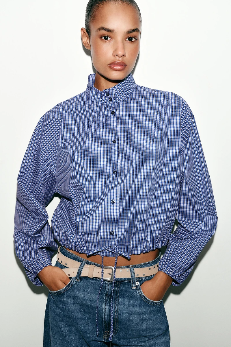 CHEMISE À CARREAUX ET MANCHES BOUFFANTES