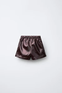 BOW PATENT LEATHER SKORT