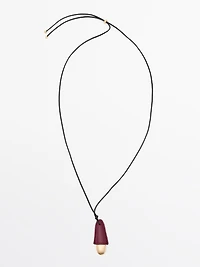 Pendentif pièce en cuir