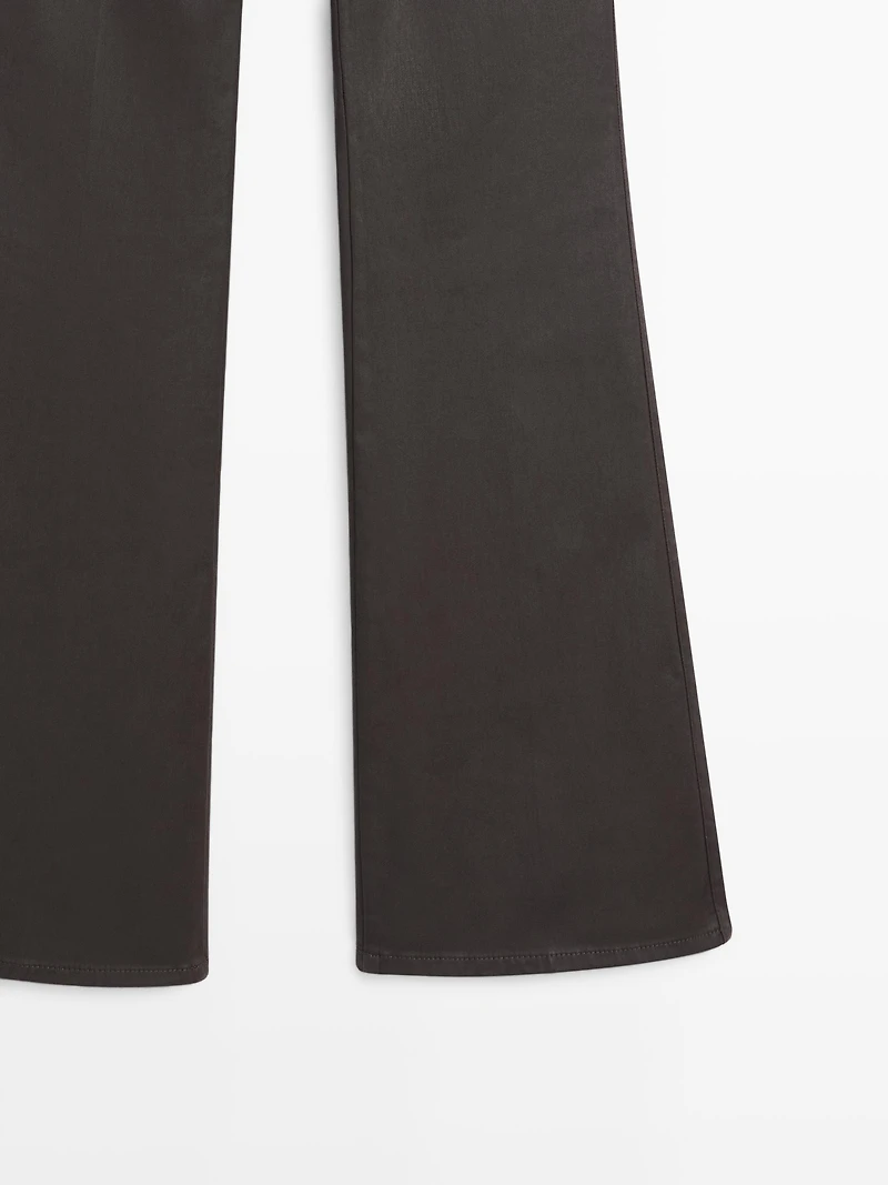 Waxed flare fit trousers