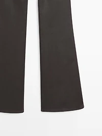 Waxed flare fit trousers
