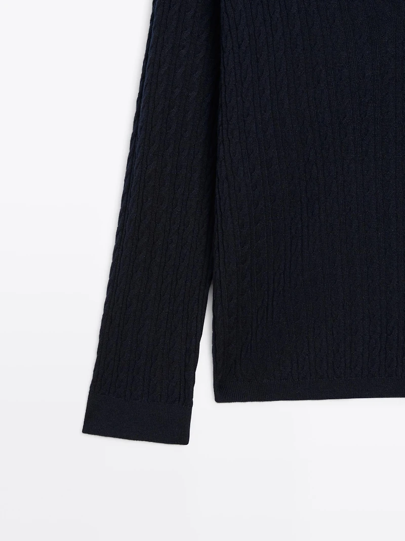 V-neck cable-knit sweater