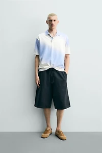SPRAY EFFECT PRINT KNIT POLO SHIRT
