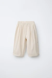 CANVAS BALLOON PANTS WITH LABEL