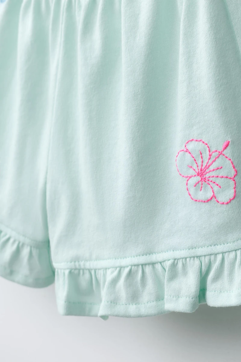 SHORT À VOLANTS IMPRIMÉ TROPICAL