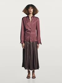 Jupe midi à plis nervurés finition enduite