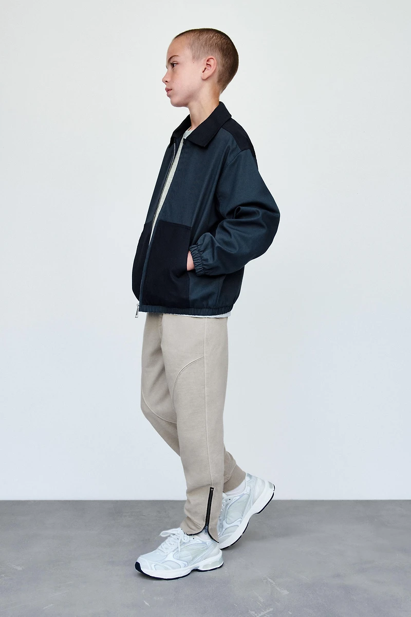 PANTALON JOGGER ZIPPÉ