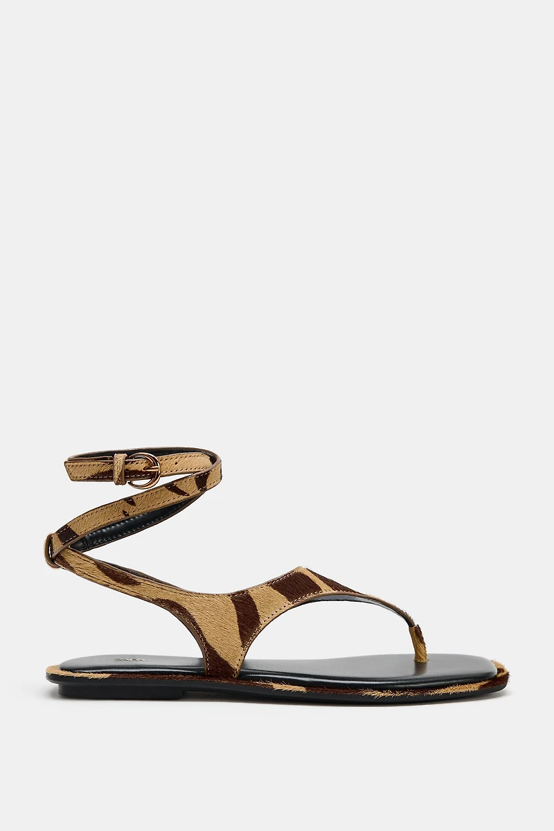 ANIMAL PRINT LEATHER SANDALS WITH FUR EFFECT