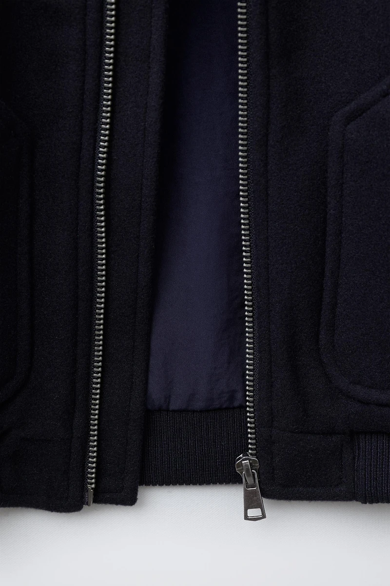 VESTE EN LAINE À POCHES