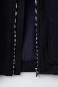 VESTE EN LAINE À POCHES