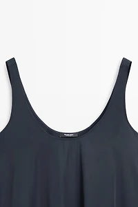 Flowing flared dress with straps