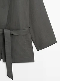 Short cotton blend trench coat with belt