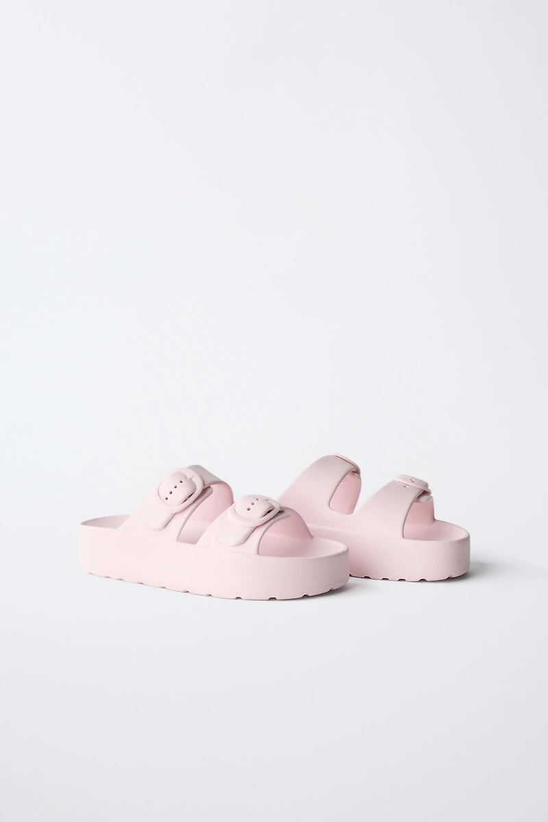 RUBBERIZED BUCKLED SANDALS