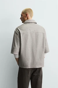 SURCHEMISE RELAXED FIT MATIÈRE SYNTHÉTIQUE