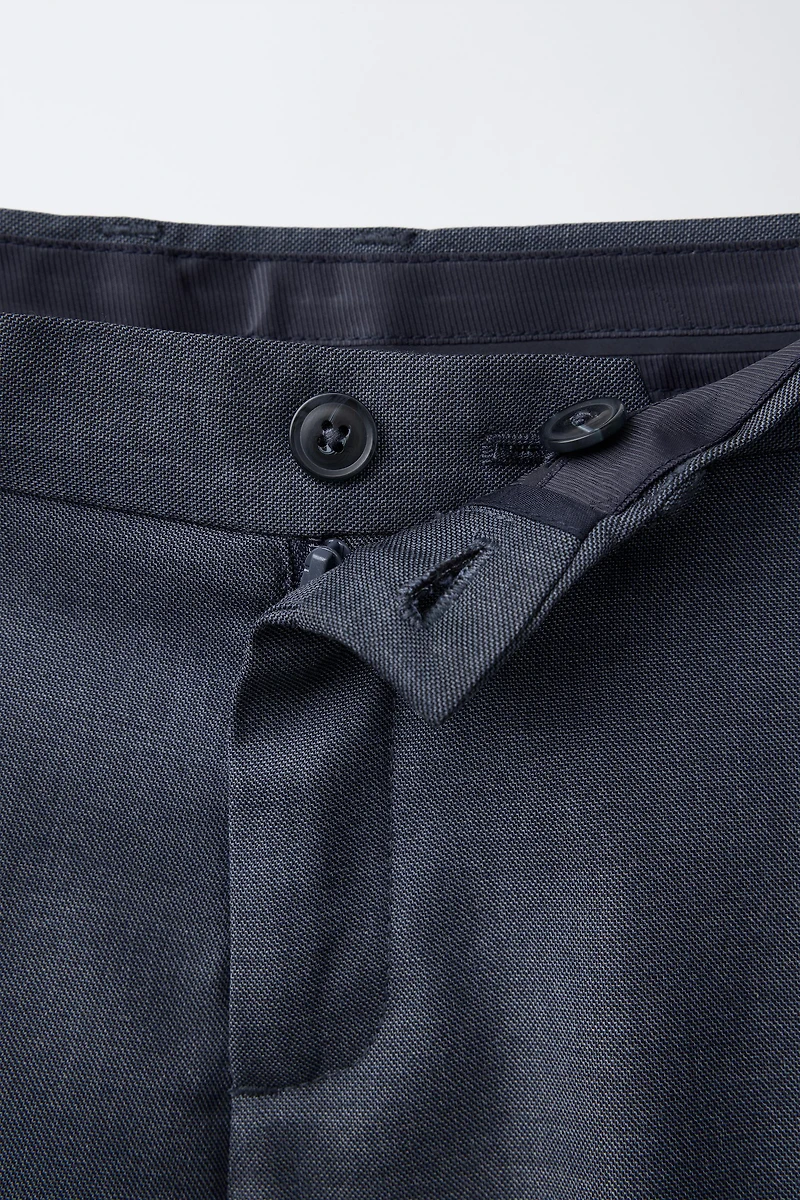 TEXTURED SUIT PANTS