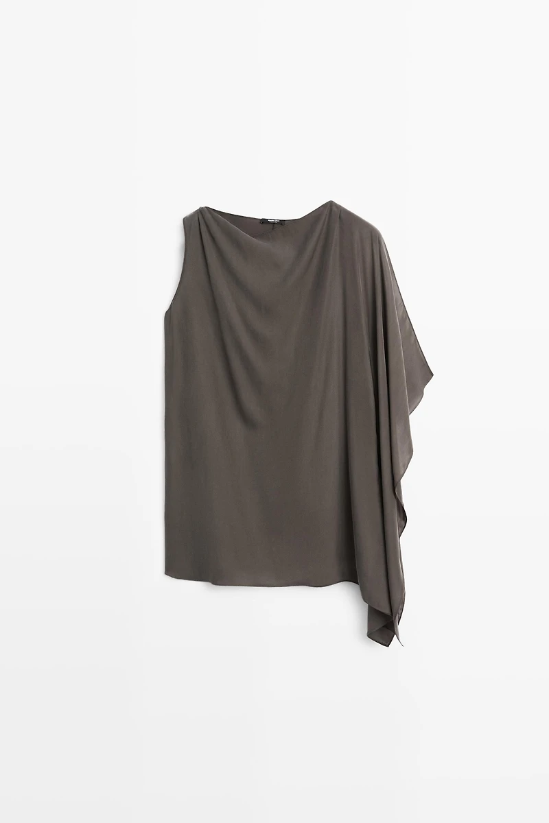 Top cape fluide asymétrique