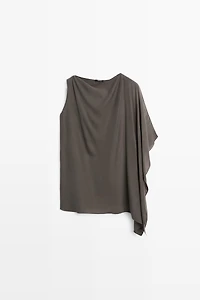 Top cape fluide asymétrique