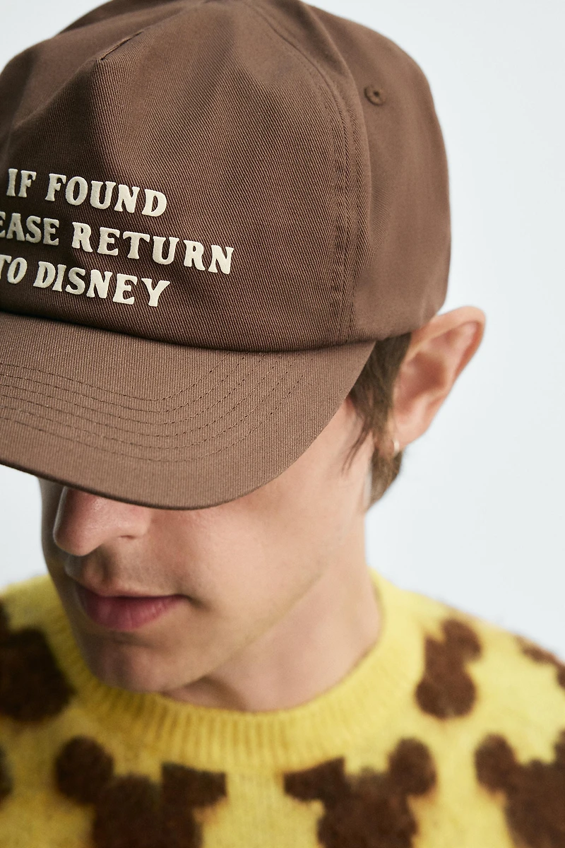 TEXT CAP HARRY LAMBERT FOR ZARA X DISNEY