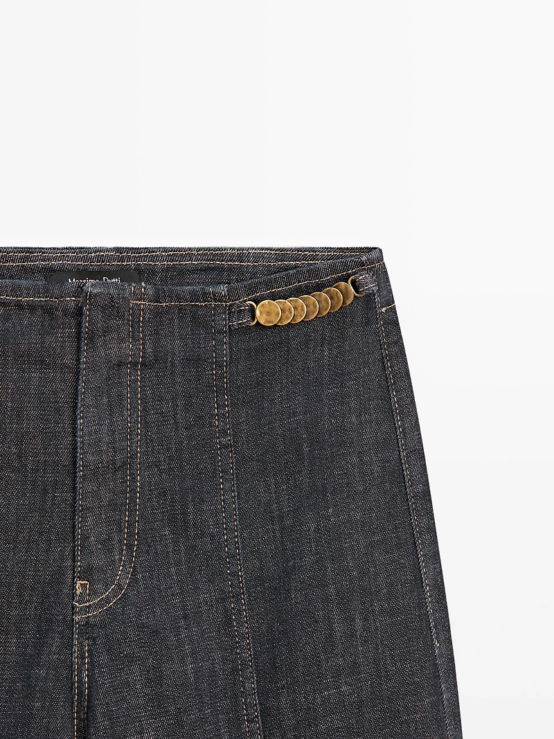 High-waist wide-leg jeans with chains