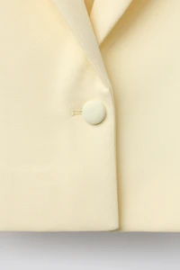 VESTE AVEC DÉCORS