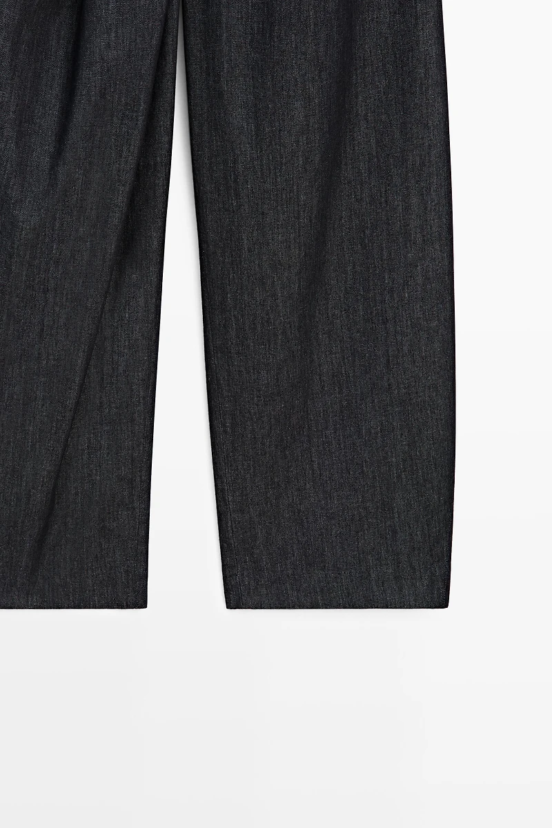 High-waist pants with crossover detail
