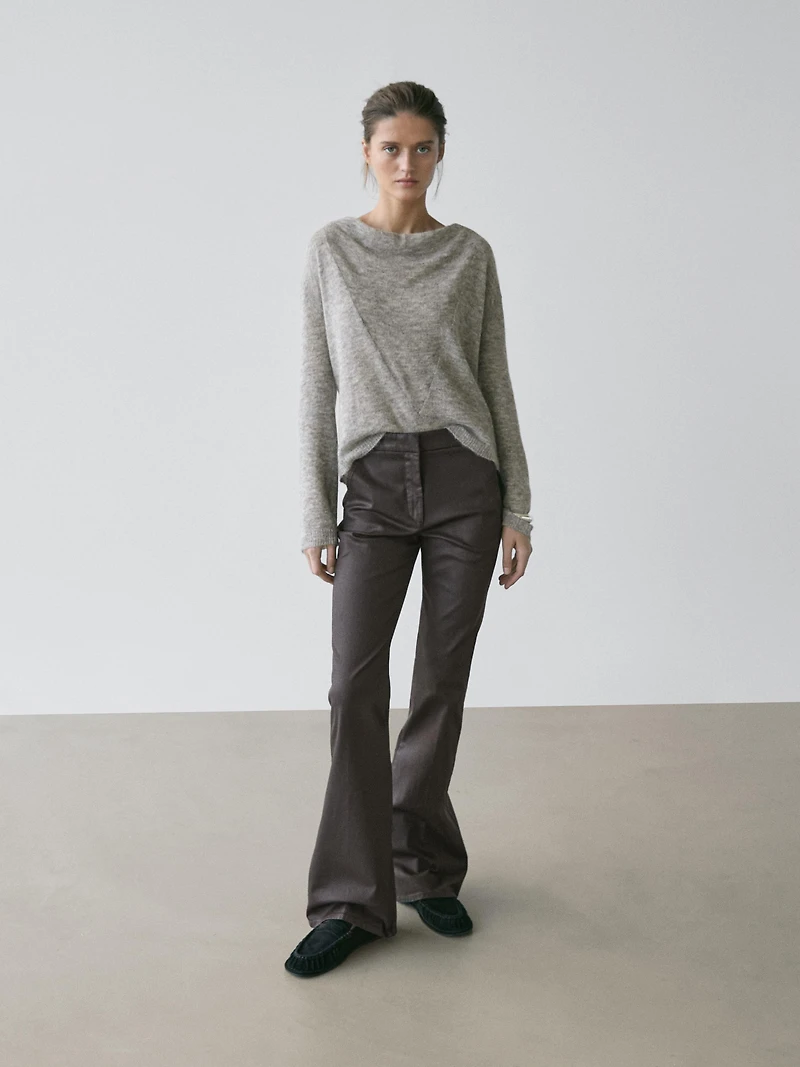 Waxed flare fit trousers