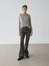 Waxed flare fit trousers