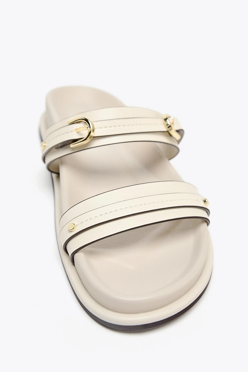 FLAT BUCKLED SANDALS