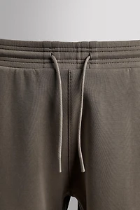 TECHNICAL ZIP PANTS