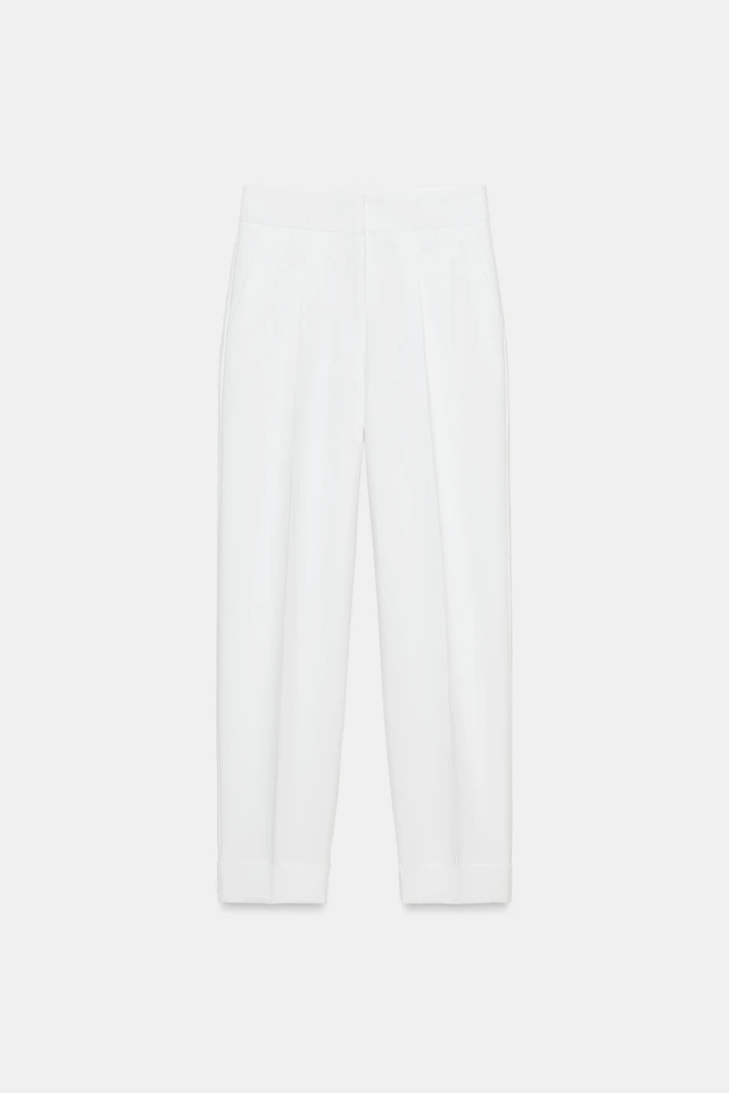 PANTALON À PLIS ET BAS REVERS