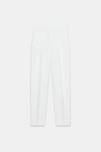PANTALON À PLIS ET BAS REVERS