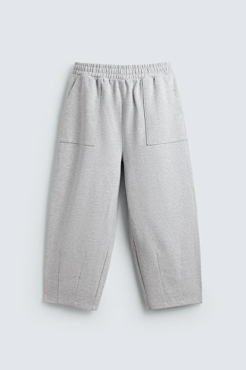 PANTALON DE JOGGING COUPE BALLON AVEC PIÈCE