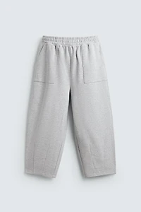 PANTALON DE JOGGING COUPE BALLON AVEC PIÈCE