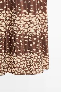Flowing animal print midi dress