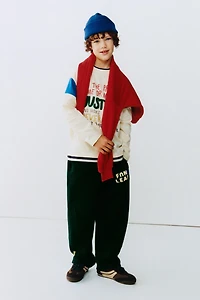 TEXT PRINT BALLOON PLUSH PANTS