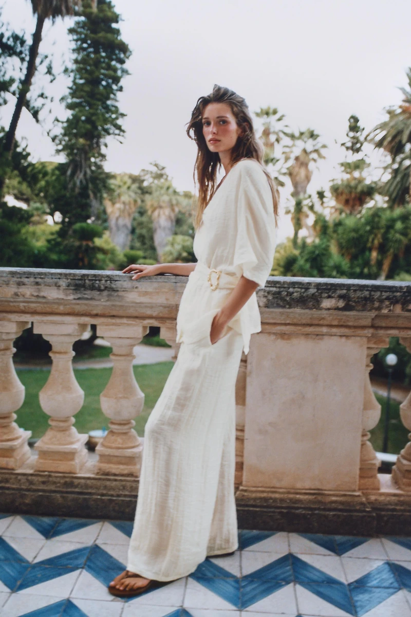 BELTED TOP WITH BUCKLE