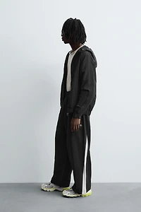 TECHNICAL PANTS WITH STRIPES