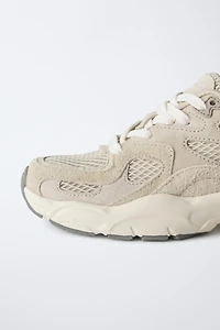 TENNIS AVEC EMPIÈCEMENTS