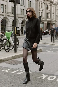 FAUX LEATHER SPLIT SKIRT WITH OVERLAP DETAIL