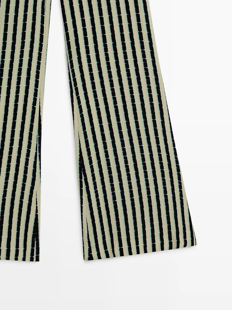 Pantalon flare à rayures