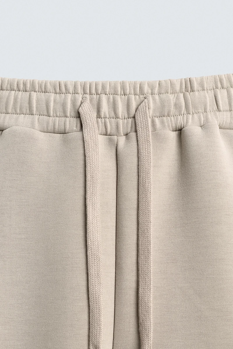 SHORT LONG EFFET NÉOPRÈNE À PINCES