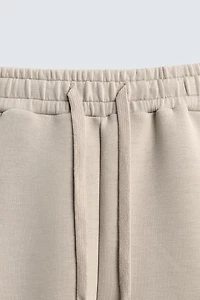 SHORT LONG EFFET NÉOPRÈNE À PINCES